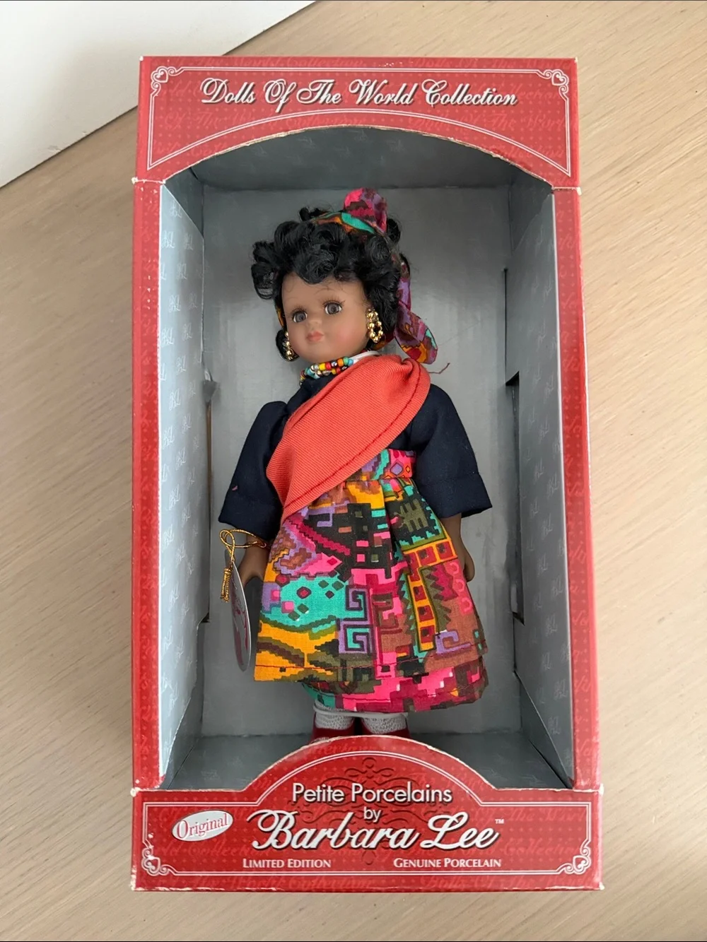 Petite Porcelain Doll in Multicolor Traditional Outfit